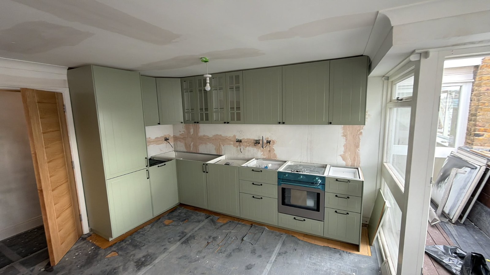Sleek Practical Kitchen in Hammersmith